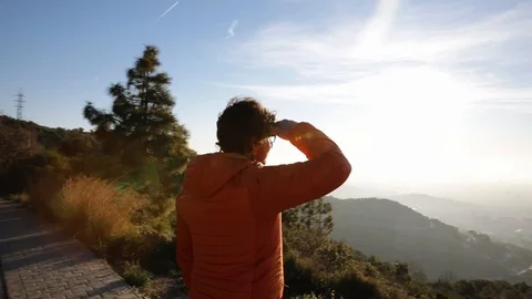 Man watching the sunrise Stock Footage 104123649