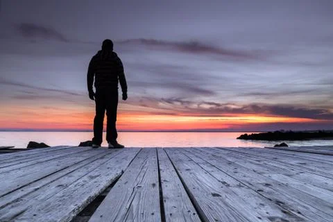 Man watching the sunset Foto stock