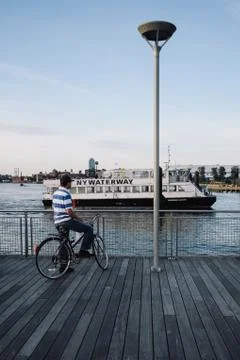 Man watching sunset in williamsburg Stock Photos