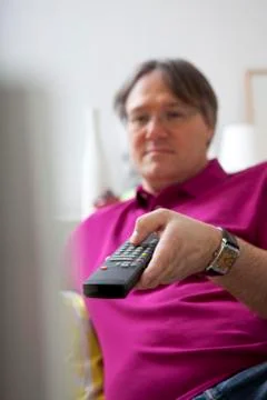 Man watching television Stock Photos