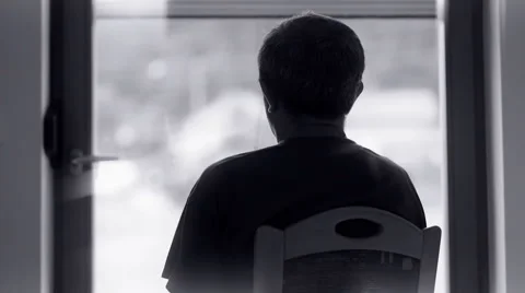 Man watching through window Stock Footage 45607638