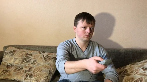 Man watching tv 4k Stock-Footage 103545920
