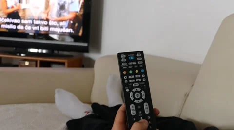 Man Watching Tv Changing Channels Stock Footage 49311029