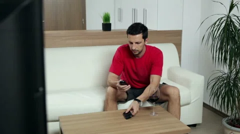 Man watching TV Stock Footage 47251632