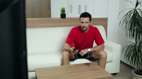 Man watching TV Stock Footage 47252331