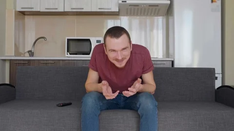 A man is watching TV Stock Footage 107653682