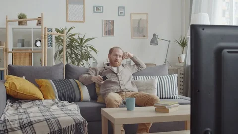 Man Watching TV Stock Footage 125302051