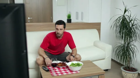 Man watching TV at home Stock Footage 47247986