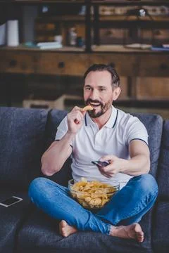 Man watching tv Stock Photos