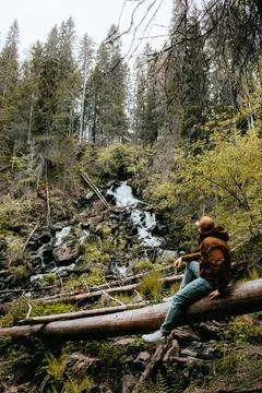 A man is watching the waterfall Stock Photos