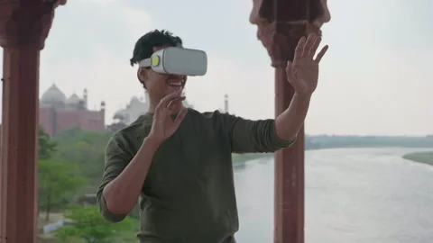 A man watching wearing VR headset. Stock Footage 139940158