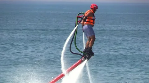 Man on Water Jet Pack Flyboard near Sea Beach Resort Video stock 40322680