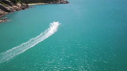 A man on a water scooter Stock Footage 77871332