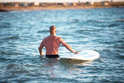 The man in the water with SUP Stock Photos