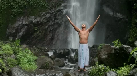 Man at waterfall Stock Footage 23325978