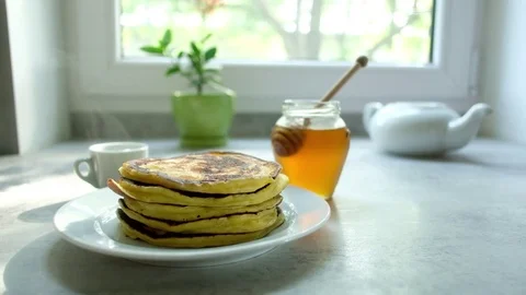 Man watering punkkeys with maple syrup Video stock 82307777