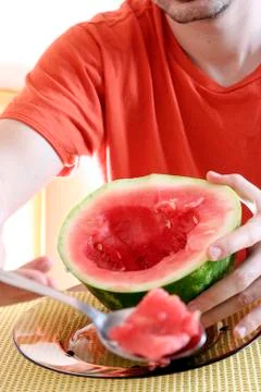 Man with watermelon Stock Photos
