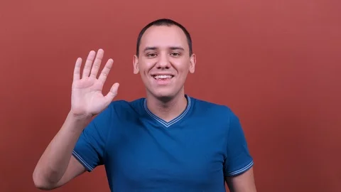 Man waves Hello. man emotion isolated. People sincere emotions, lifestyle Stock Footage 123017280
