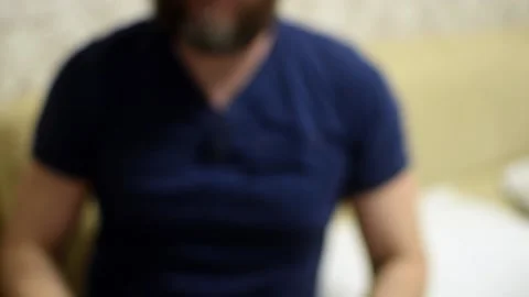 A man waves his hands and shows a fig gesture Video stock 130865674
