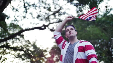 Man waving an american flag Stock Footage 44262476