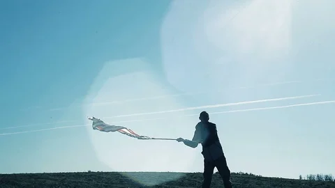 A man waving The American flag Stock Footage 96231288