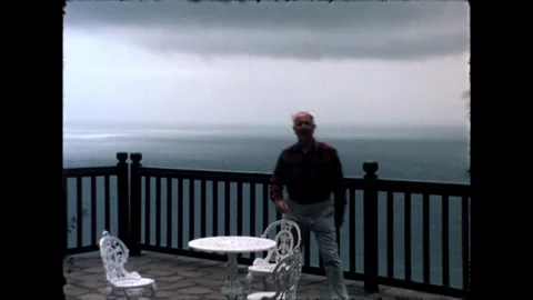 Man Waving on Balcony Stock Footage 278167231