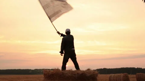 Man waving a flag Stock Footage 32863858