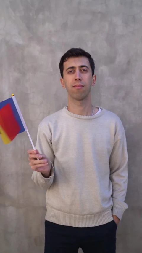 Man waving the Moldovan flag. Vertical shot in slow motion. Stock Footage 340315210