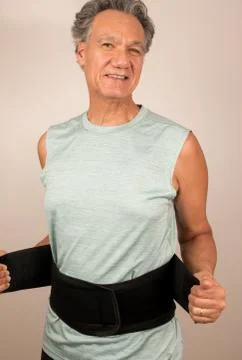 Man Wearing Back Brace Stock Photos
