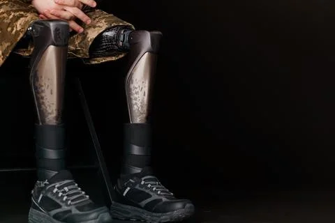 Man Wearing Bionic Leg Prosthesis in Military Informed Outfit Stock Photos