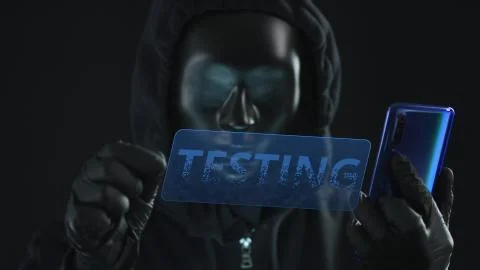 Man wearing black mask pulls TESTING tab from a smartphone. Hacking concept 스톡 일러스트