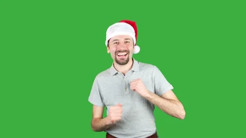 Man wearing christmas hat is dancing Stock Footage 237243115