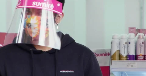 Man wearing face shield, reopen business safely after covid closures Stock Footage 140042957