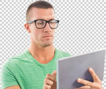 Man wearing glasses while using tablet computer Stockfoto's