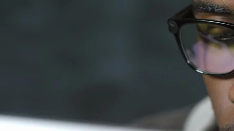 Man Wearing Glasses while Working with Computer Video stock 103529802