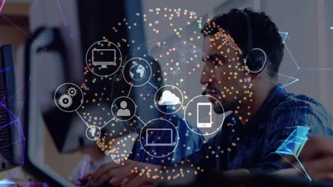Man wearing headset typing in tech office creating globe with cloud gear user Stock Footage 314849173
