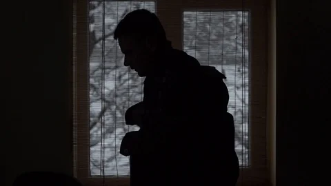 The man is wearing a jacket. It is a cold winter Stock Footage 114630930