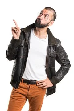 Man wearing a leather jacket thinking Stock Photos