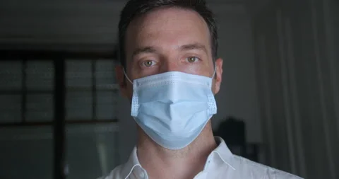 Man wearing mask smiling in slowmotion 库存影片 137924714