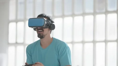 Man wearing new generation virtual gaming headset. Stock Footage 278088961