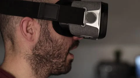 Man wearing Professional Virtual Reality Headset for the Metaverse concept Stock Footage 168431939