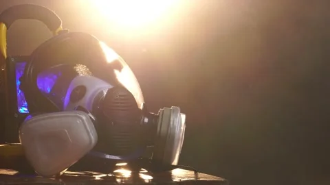 Man wearing protective suit and gas mask standing in fog Stock Footage 221083316
