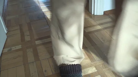Man wearing slippers Stock Footage 71679454