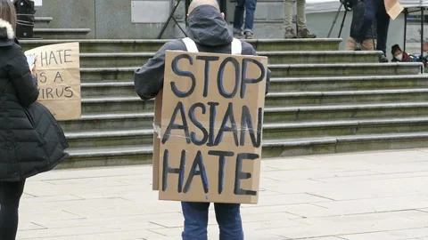 Man Wearing Stop Asian Hate Sign At Rally Video stock 151656891