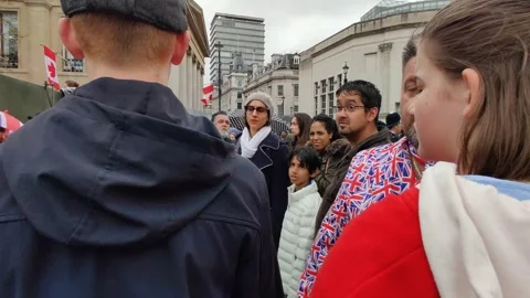 MAN WEARING UNION JACK JACKET LONDON FOR KING CHARLES CORONATION 6 MAY 2023 4K Stock Footage 240492099
