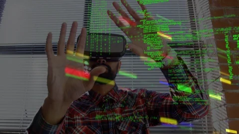 Man wearing virtual goggles and program codes Vidéo 107715413