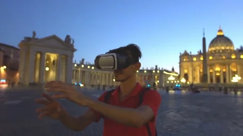 Man wearing virtual reality glasses in Vatican, St. Peter's basilica, Rome, Ital Stock Footage 80250561