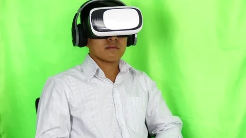 Man wearing virtual reality goggles. Studio shot, 스톡 동영상 83109400