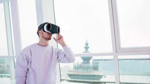Man wearing virtual reality goggles Stock Photos
