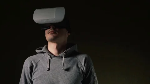 Man wearing virtual reality headset at living room. Stock Footage 74385448